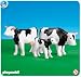 2 Black and White Cows with Calf