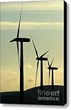 Silhouetted wind turbines against a cloudy sky Canvas Print / Canvas Art - Artist Sami Sarkis