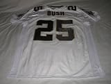 Reggie Bush Autographed New Orleans Saints Super Bowl XLIV Jersey W/PROOF, Picture of Reggie Signing For Us, New Orleans Saints, Super Bowl Champions, Miami Dolphins, USC Trojans, Heisman Trophy Award, National Champion
