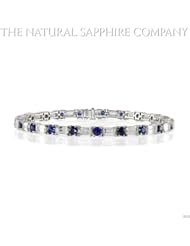 18KW Bracelet with 6.99ctw round blue sapphires and 3.60ctw emerald cut white sapphires, 7"