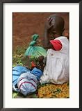A Young Boy Holds His Sisters Hand as She Waits for Treatment against Malaria Associated Press Collection Framed Photographic Poster Print, 21x29