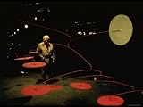 Alexander Calder Walking Past Exhibit of His Mobiles at the Guggenheim Museum Artists Premium Photographic Poster Print by Gjon Mili, 18x24