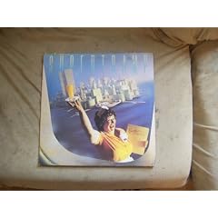 Breakfast in America by Supertramp, Roger Hodgson [guitar keyboards and vocals], Rick Davies [keyboards and vocals], Richard "Slyde" Hyde [trombone and tuba], and John Helliwell [saxophone woodwinds and vocals] (Vinyl - 1979)