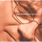 Click here to buy Behind Open Doors by  Laszlo Gardony .
