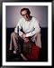 Filmmaker Woody Allen Sitting on Sofa with His Clarinet and an Open Clarinet Case at His Feet Framed Art Poster Print by Ted Thai, 39x49