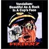 Vandalism: Beautiful As a Rock in Cop's Face