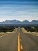 View of Highway 82, Tombstone, AZ Photographic Poster Print by Walter Bibikow, 42x56