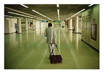 An Exhausted Traveler Drags His Bag Through Bangkoks Airport Transportation Photographic Poster Print by Eightfish, 24x18
