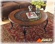 Primmrose Round Cocktail Table By Ashley Furniture