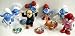 The Smurfs Schleich Officially Licensed 12 Piece Figure Play Set Featuring Papa Smurf, Gargamel, Azrael, Grape Vineyard Picking Smurf, Baker Smurf, Devil Smurf, Weight Lifter Smurf, Scared Silly Smurf, and 4 Unique Smurf Backpack Buttons