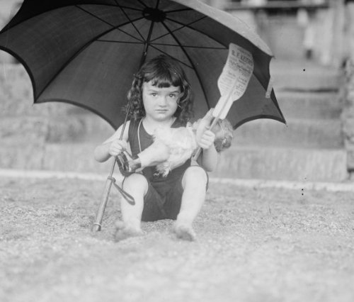 1923 June 28. Photograph of Girl in bathing suit holding umbrella, 6/28/23