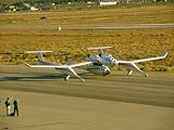 The White Knight Aircraft with Spaceshipone Underneath on a Runway Photographic Poster Print by Jim Sugar, 12x16