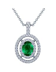 Platinum Oval Cut Emerald And Round Diamond Pendant