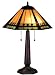 This lamp shade, inspired by the clean geometric lines of the mission style, has diamonds and bands 
of root beer granite glass on panels of bone beige and moss green. Hand cut pieces of glass are 
wrapped in copper foil and soldered together in the Tiffany tradition to make this handsome shade. 
The hexagonal shaped shade is matched with a similarly shaped base, hand finished in mahogany 
bronze. Height: 25 Inches, Width: 17,5 Inches, Shade Height: 8 Inches, Shade Width: 17,5 Inches, 
Number of Bulbs: 2, Bulb Watts: 60.