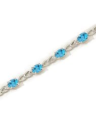 14kt Yellow Gold Oval Blue Topaz and Diamond Bracelet