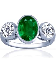 Platinum Oval Cut Emerald Three Stone Ring