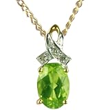9ct Yellow Gold Diamond Set Ribbon with Peridot Pendant on 18 Curb Chain