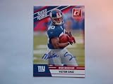 2010 Donruss Rated Rookie RC Victor Cruz Auto Autograph in a One touch case.