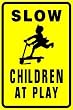 SLOW CHILDREN AT PLAY warn street park sign