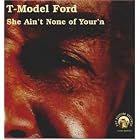 Click here to buy She Ain't None of Your'n by T-Model Ford .