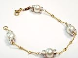 Natural Colored 7.0mm Cultured Akoya Pearls Set on a 14K Yellow Gold Twisted Hand-Crafted Link Bracelet, Enhanced with White Gold Roundels.