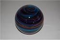 Spiralling effect planet paperweight