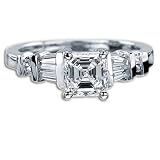 1.00 CT MODIFIED EMERALD CUT DIAMOND RING E VS2-18K