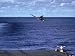 Landing Signal Officer Communicating with American Pilot Preparing to Land on Palau I...