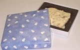 Scott's Cakes 1 lb. White Chocolate Cashew Bark in a Snowman Box