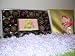 Baby Chocolate Bar surrounded by 20 Assorted Chocolates complete with a Chocolate Rocking Horse Lollipop