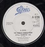 STILL HURTIN` ME 7" (45) UK EPIC 1985 B/W RUNNIN WITH THAT CROWD (A6706)