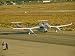 The White Knight Aircraft with Spaceshipone Underneath on a Runway National Geographic Collection Photographic Poster Print by Jim Sugar, 24x18