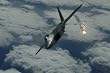 F-22 Raptor (Above Clouds, Firing) Art Poster Print - 13" X 19"