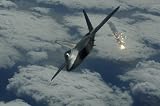 F-22 Raptor (Above Clouds, Firing) Art Poster Print - 13x19