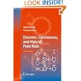 Discrete Continuous Hybrid Petri Nets
