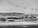 Beach in Australia, Banner from Airplane Saying Learn to Swim Photographic Poster Print by John Dominis, 16x12