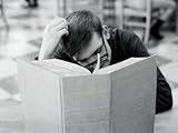 Man Sitting at Library Table, Scratching Head, With Large Book Open in Front of Him Photographic Poster Print by H. Armstrong Roberts, 24x32