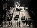 People are Seen Backlit as They Head to Work on a Warm, Muggy Morning Photographic Po...