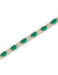 14kt Yellow Gold Oval Emerald Bracelet.