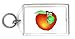 Keychain with green, apple, hole, eating, worm