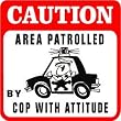 CAUTION: AREA PATROLLED BY COP police sign