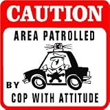 CAUTION: AREA PATROLLED BY COP police sign