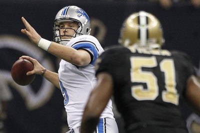 Detroit Lions and New Orleans Saints: Matthew Stafford Photographic Poster Print by Dave Martin, 24x16