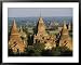 Buddhist temples with large conical tops reach heavenward Framed Art Poster Print by ...