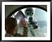 A Child (No Name Given) Looks Through a Window into the Pool of a Group of Seals Playing Underwater Associated Press Collection Framed Art Poster Print, 49x39