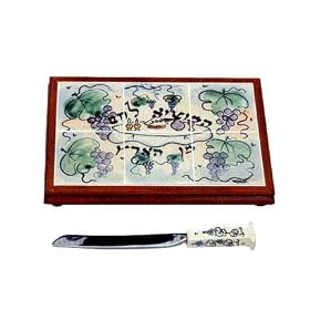 Click here to buy ArtisanStreet's Judaica Challah Board and Knife Set. Features Grape Design. Hebrew Inscription.....