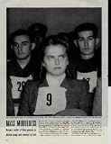 MASS MURDERESS: Irma Grese listens pensively to testimony of her deeds. Woman leader of Nazi guards at Belsen camp sets record for evil. Grese was among the 44 people accused of war crimes at the Belsen Trial. She was tried over the first period of the trials (September 17 to November 17, 1945) and was represented by Major L. Cranfield. Grese and ten others (eight men and two other women; Juana Bormann and Elisabeth Volkenrath) were convicted for crimes against humanity in both Auschwitz and Belsen and then sentenced to death. As the verdicts were read, Grese was the only prisoner to remain defiant;[5] her subsequent appeal was rejected. Irma Grese is the youngest woman to die judicially under English law in the 20th century. ..... 1945 LIFE Magazine Picture, A3094A