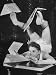 Contortionist Assembling a Dymaxion Map Photographic Poster Print by Wallace Kirkland, 12x16
