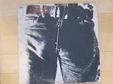 Sticky Fingers by the Rolling Stones. Vinyl LP with Zipper Cover