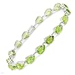 Bracelet With 21.15ctw Genuine Peridots Beautifully Designed in White Gold. Total item weight 11.3g Length 7.5in